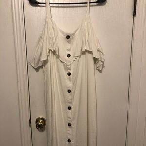 White dress with cold shoulder loop.